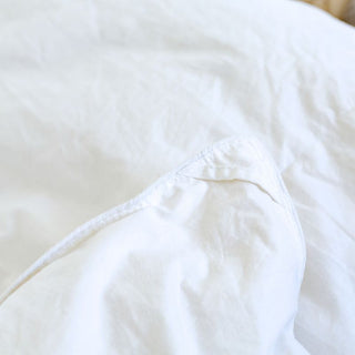 Ultra-Warm Hungarian Goose Down Quilt in white; Cozy winter quilt on a bed.